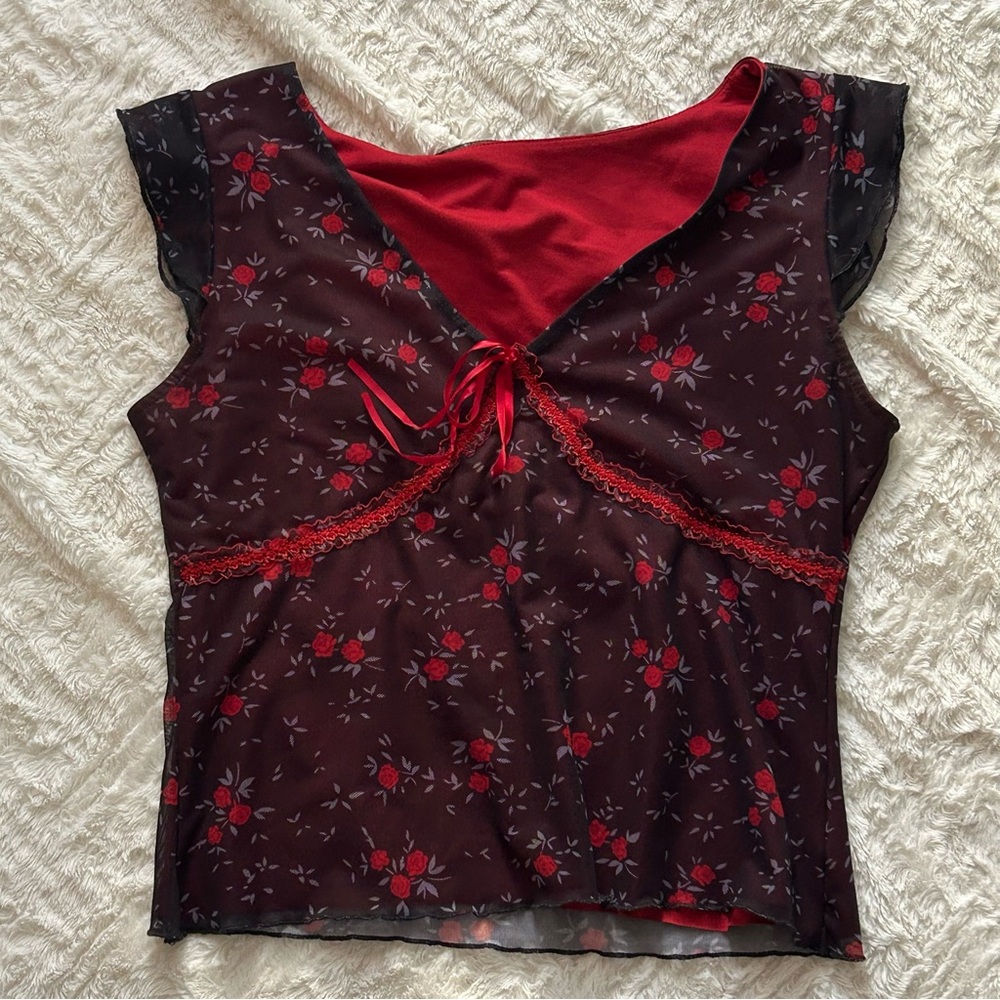 red and black floral blouse